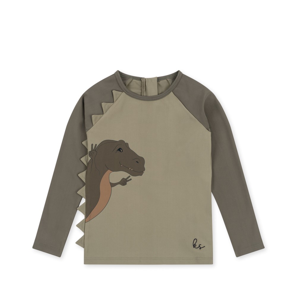KS4621-ASTER-SWIM-BLOUSE-DINO-OVERLAND-TREK-Main Langarmshirt, beige-braun, Dinosaurier-Aufdruck, gezackte Applikationen an der Seite, Rundhalsausschnitt.