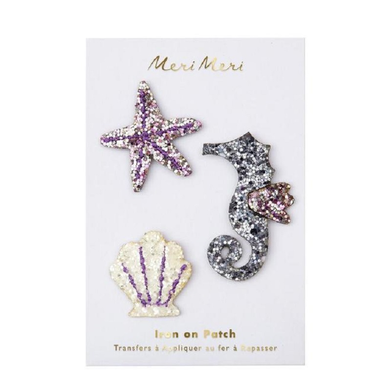 tr_h-1000_w-1000_cm-resize_pad_223561e4-88d2-4b17-8297-c50668e27992_660x Glitzer-Applikationen Set, Seestern, Seepferdchen, Muschel; Farben: Lila, Silber, Gold; Aufbügelbare Patches; Marke: Meri Meri.
