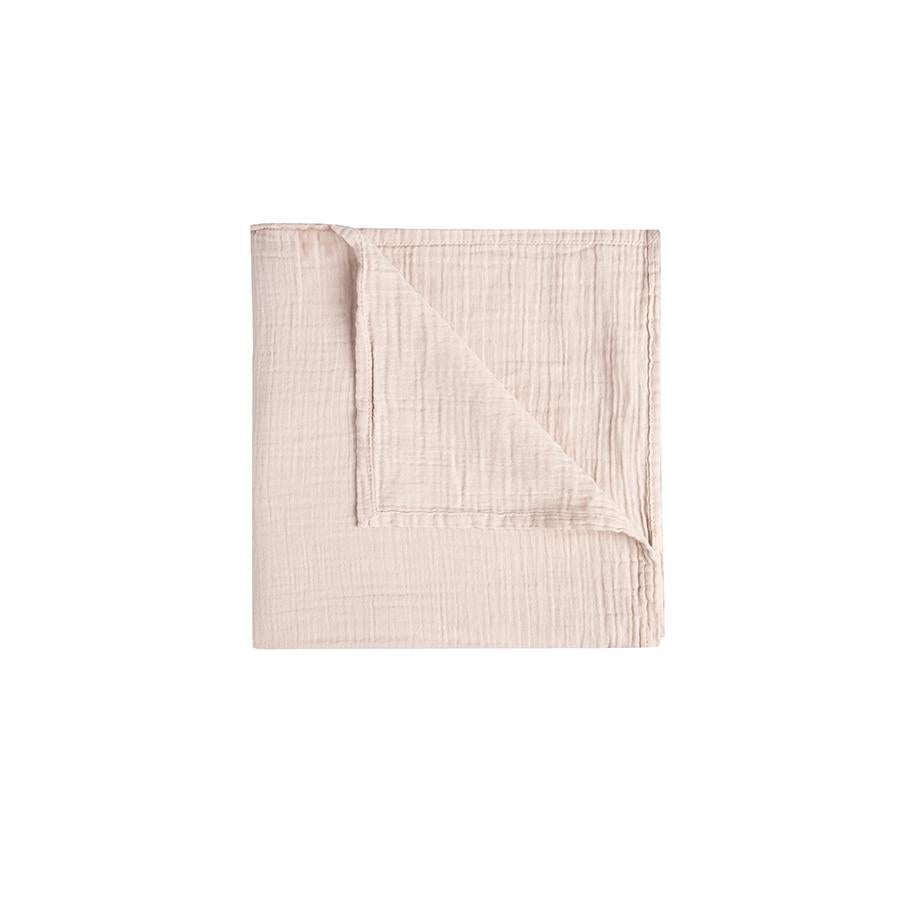 garbo-friends-decke-calamine-musselinstoff Mulltuch, rosa, gefaltete Ecke, strukturiertes Gewebe.