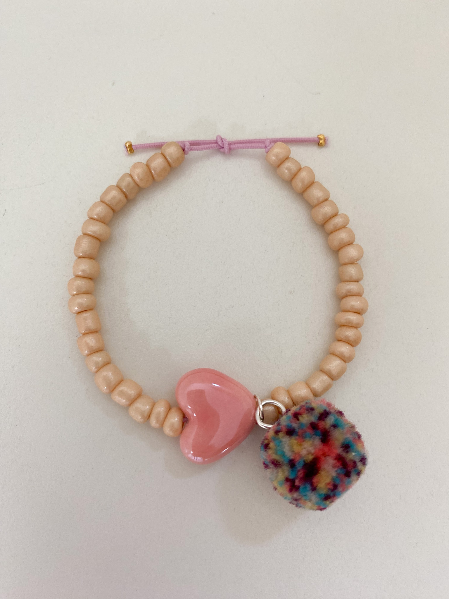 Armband mit Herz & Bommel
