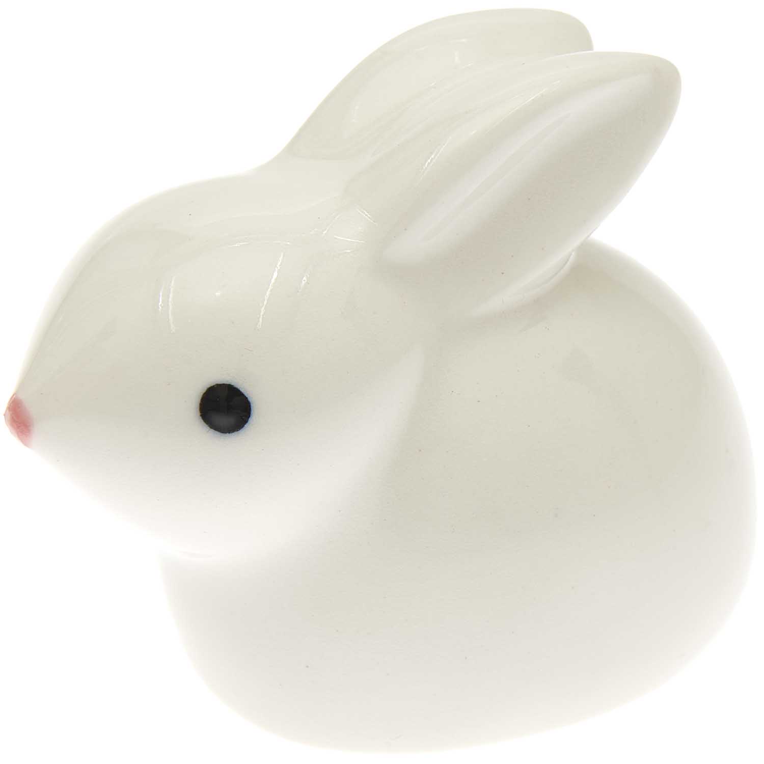 Porzellan Hase hockend