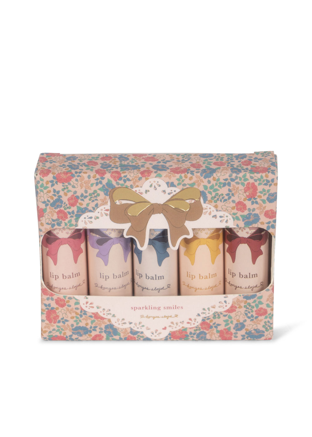 Lippenbalsam-Set, fünf Stück, Verpackung mit floralem Muster, bunte Etiketten in Rosa, Lavendel, Blau, Gelb und Rot, goldene Schleife, Aufschrift „lip balm“.