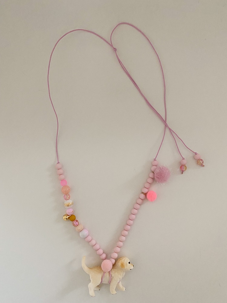 Kette mit Hundewelpe