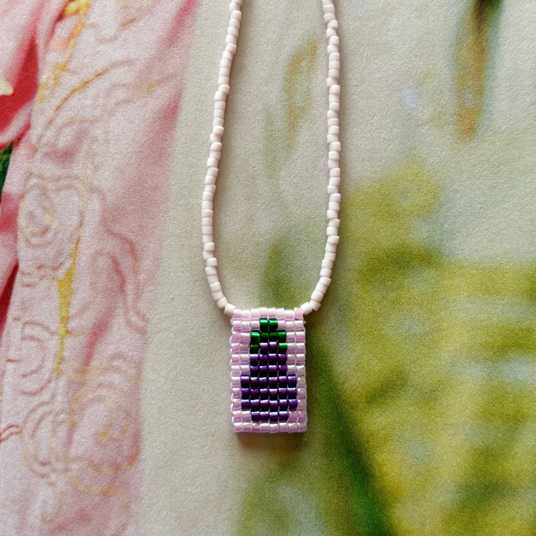 Kette mit Häkel-Anhänger Aubergine 