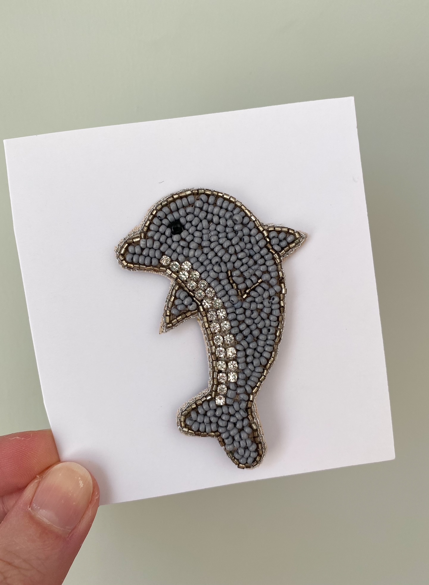 Anstecker aus Perlen Delfin