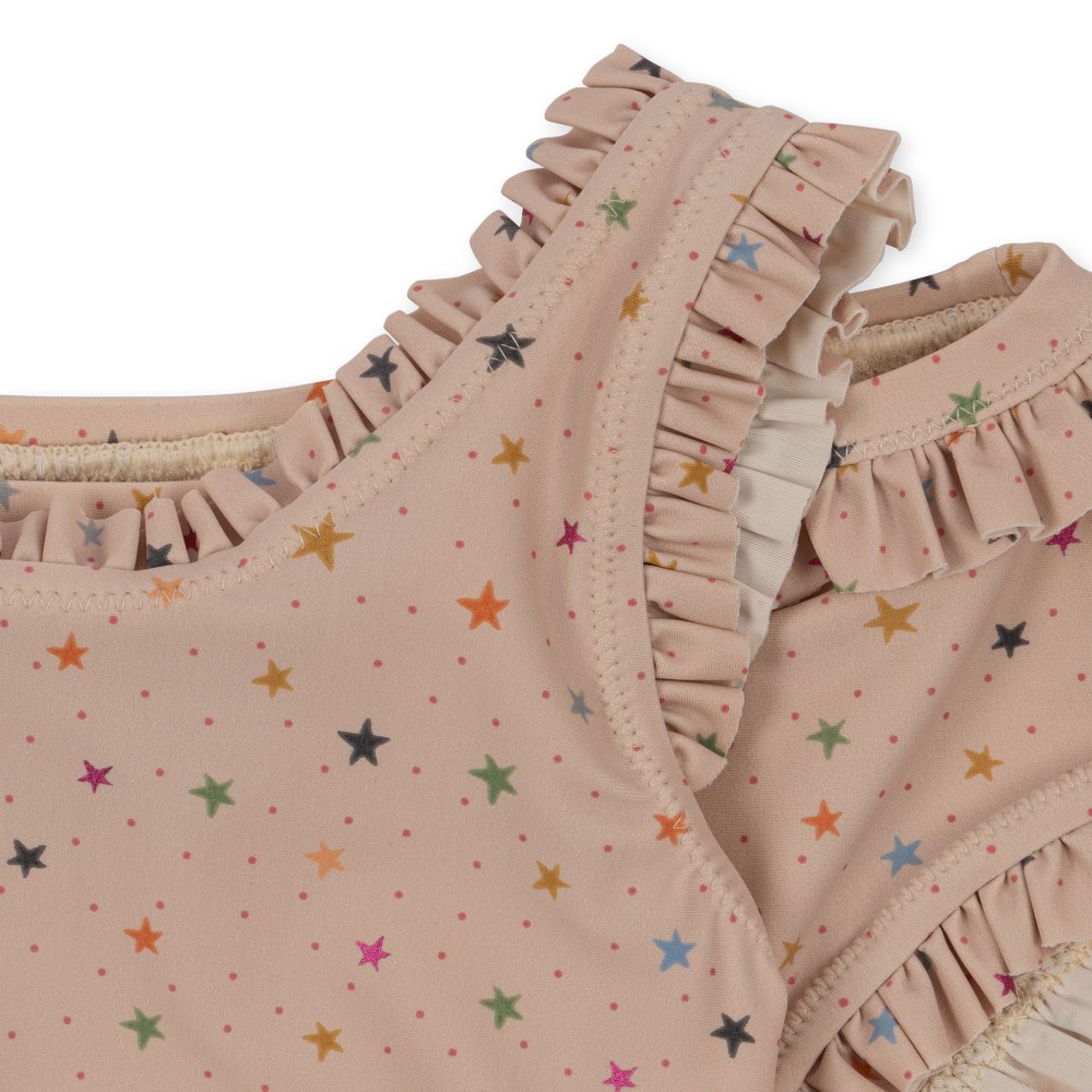 KS4723-TWINKLE-BIKINI-STAR-MULTI-Extra-2 Beige Kinder-Badeanzug, bunte Sterne, Rüschen an Trägern und Ausschnitt.