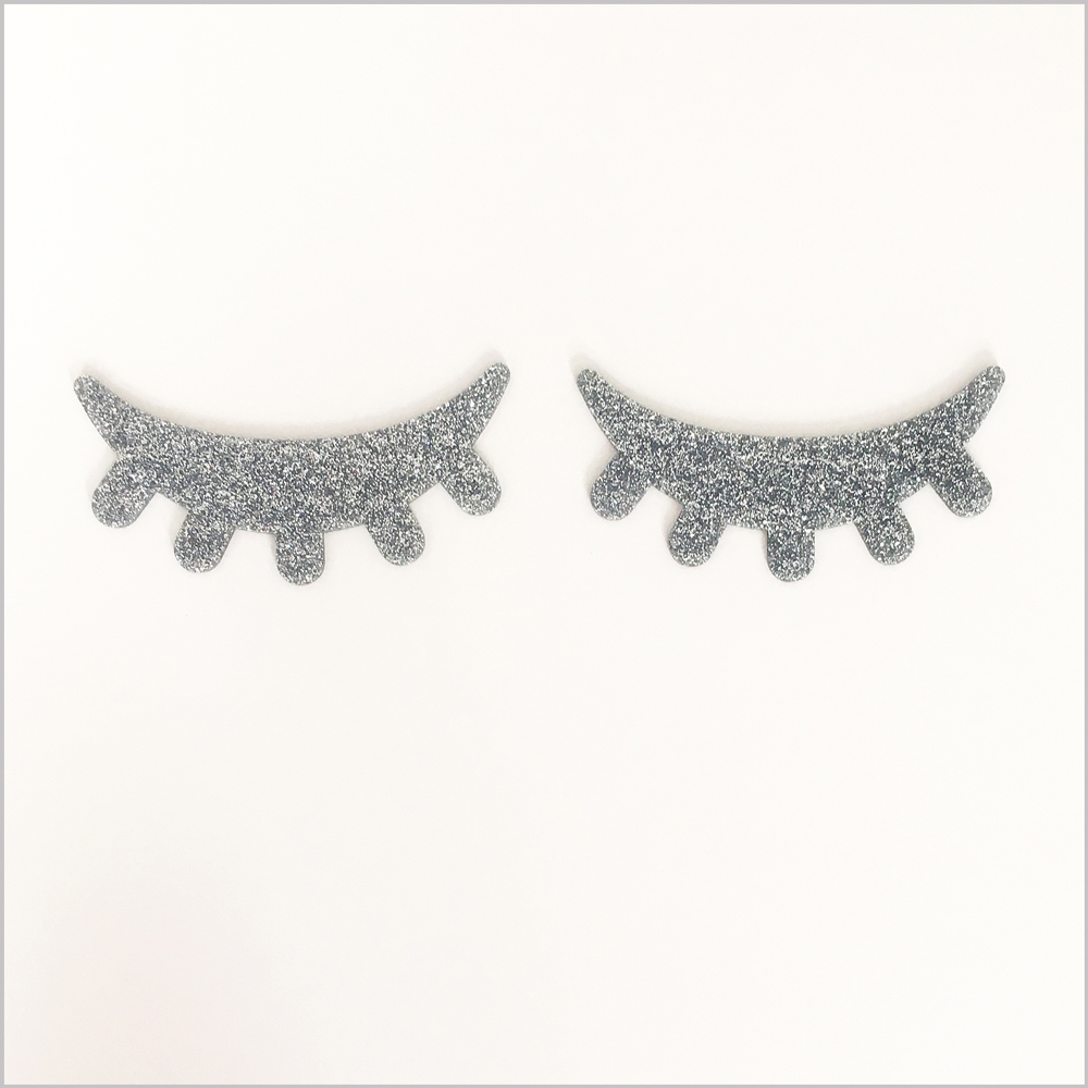 Silver-dream-eyes Glitzernde Wimpern-Sticker, silber, geschlossene Augenform.
