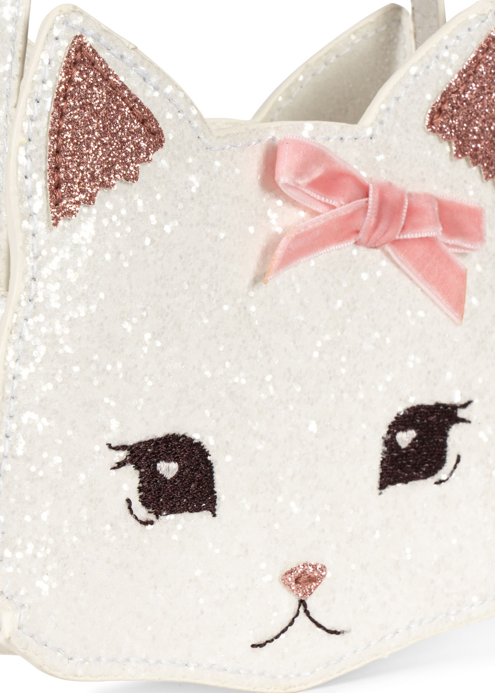 Tasche, weiß, Katzenform, glitzernde Oberflächen, rosa Schleife, rosa glitzernde Ohren, gesticktes Katzengesicht mit Herzdetails, schwarzes Stickmuster.